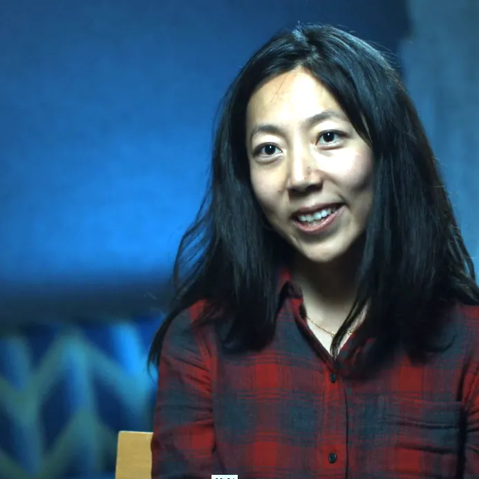Julie Zhuo, smiling, photographed during her time at Facebook.